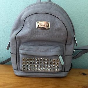 Michael Kors lilac grommet studded backpack purse